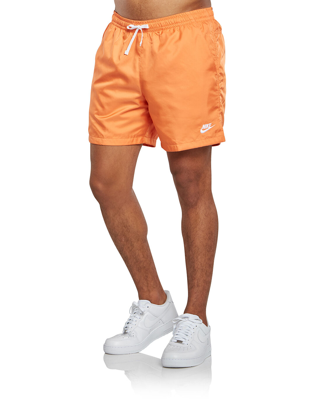 nike woven shorts orange