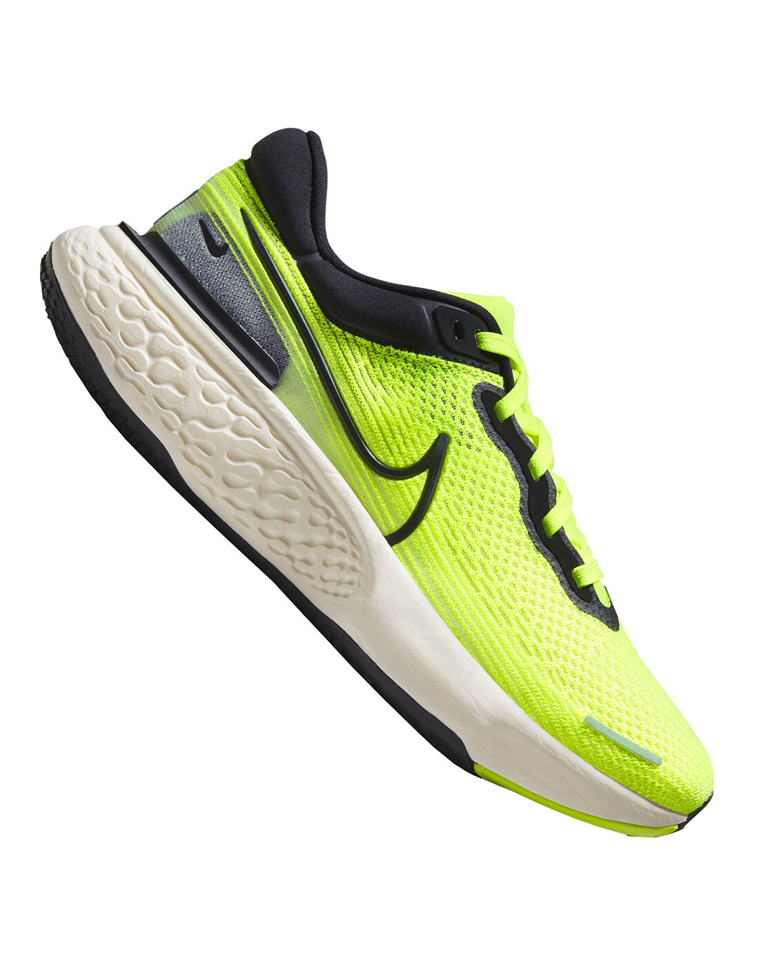 grey and neon green nike shoes